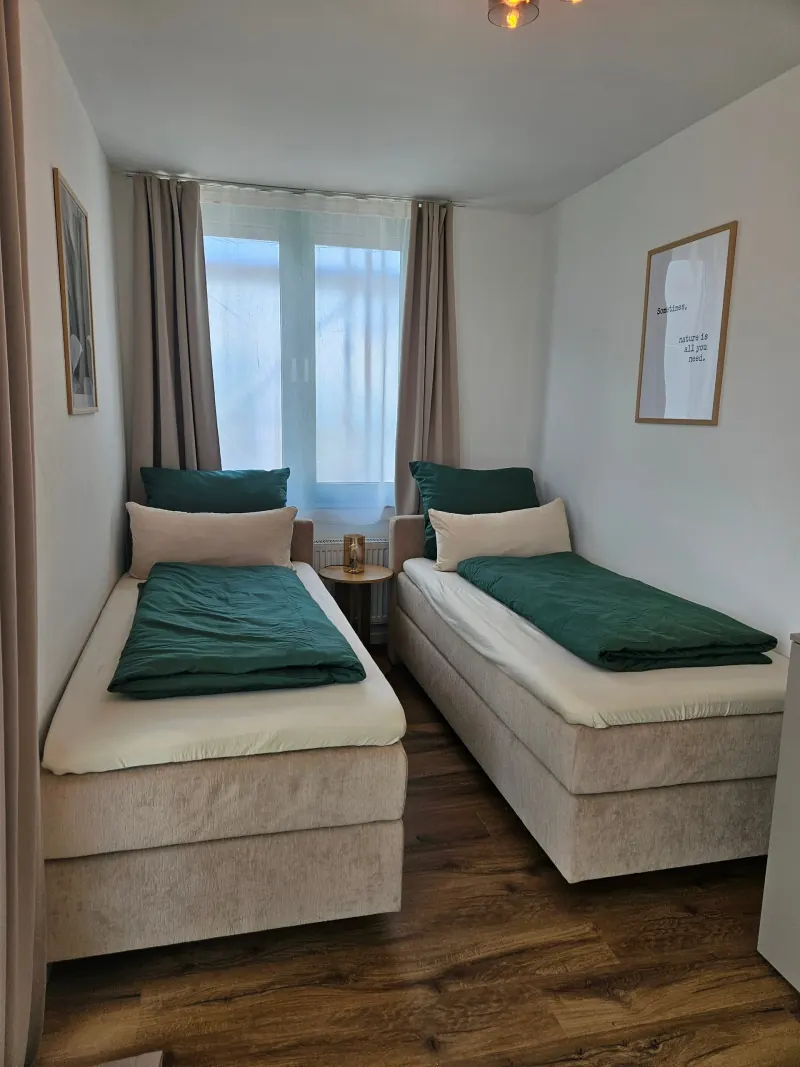 Ferienwohnung Karkopfblick: Schlafzimmer mit zwei Einzelbetten